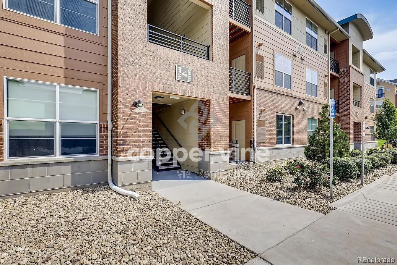 Modern 2BR/2BA Condo with Detached Garage, Community Pool, and Light Rail Access property image