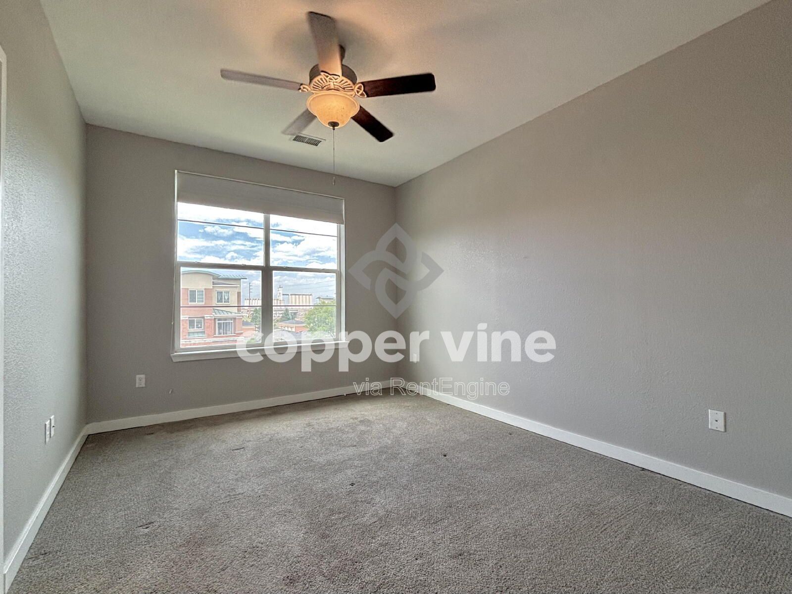 Modern 2BR/2BA Condo with Detached Garage, Community Pool, and Light Rail Access property image