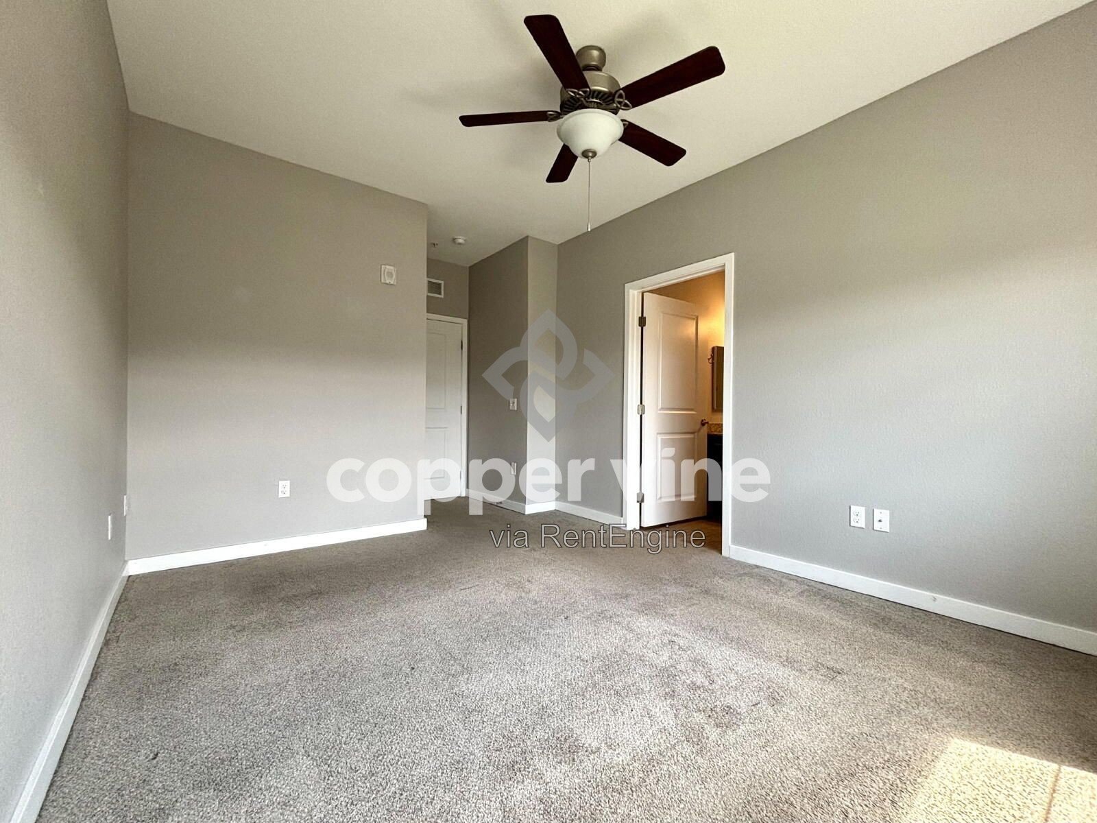 Modern 2BR/2BA Condo with Detached Garage, Community Pool, and Light Rail Access property image