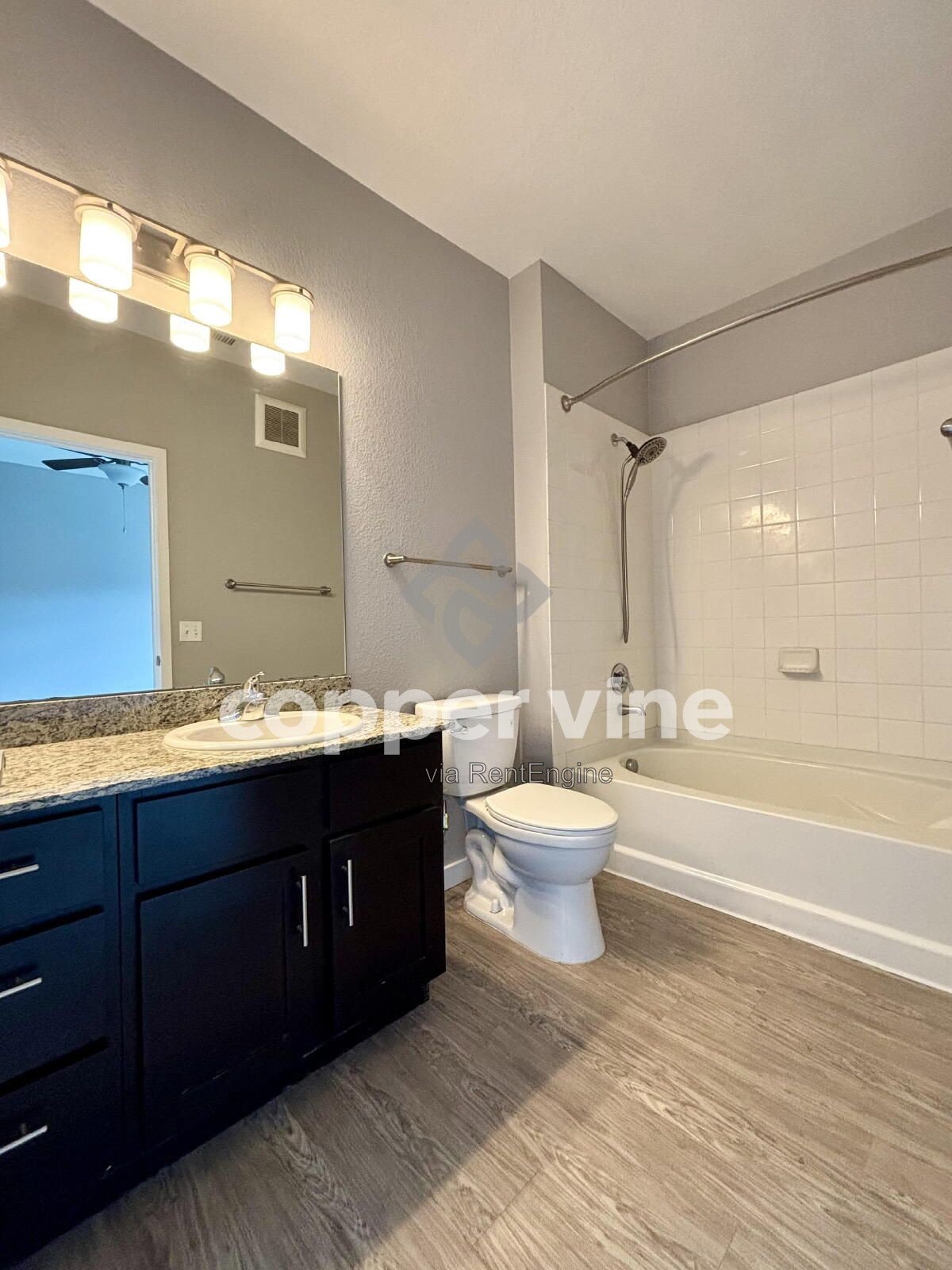 Modern 2BR/2BA Condo with Detached Garage, Community Pool, and Light Rail Access property image