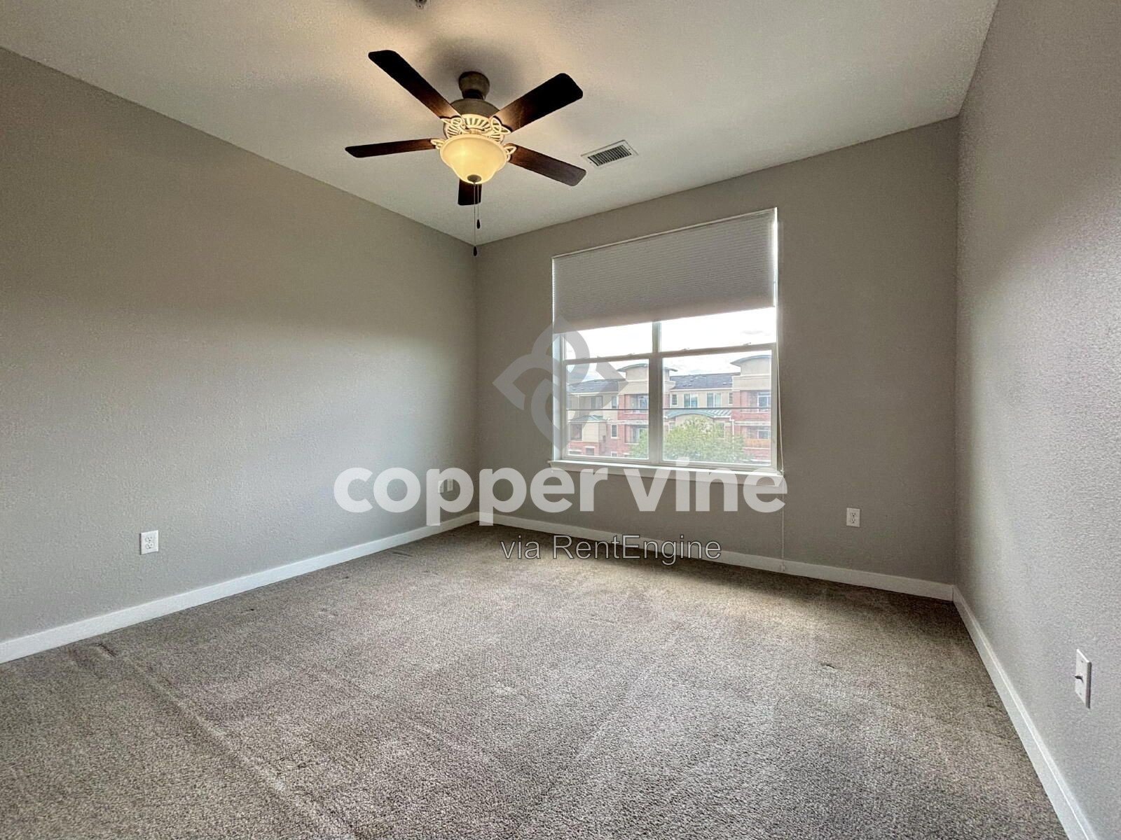 Modern 2BR/2BA Condo with Detached Garage, Community Pool, and Light Rail Access property image