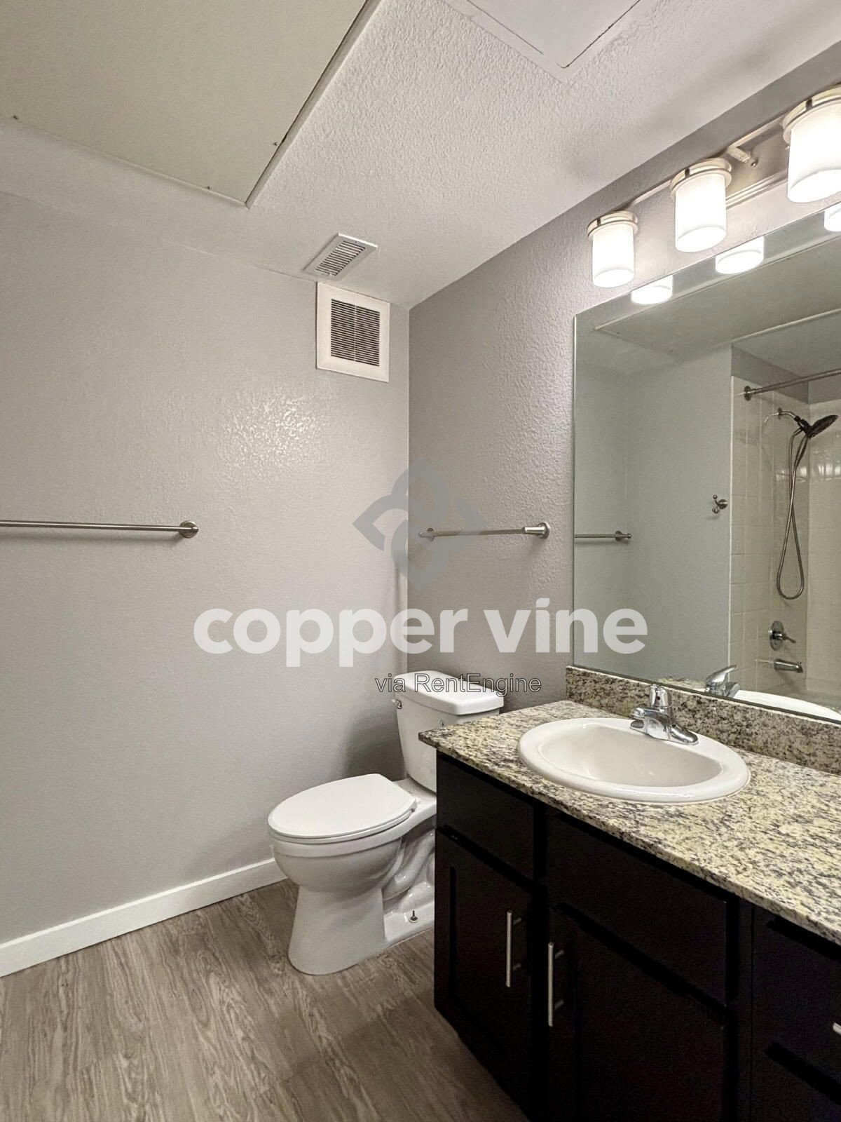 Modern 2BR/2BA Condo with Detached Garage, Community Pool, and Light Rail Access property image